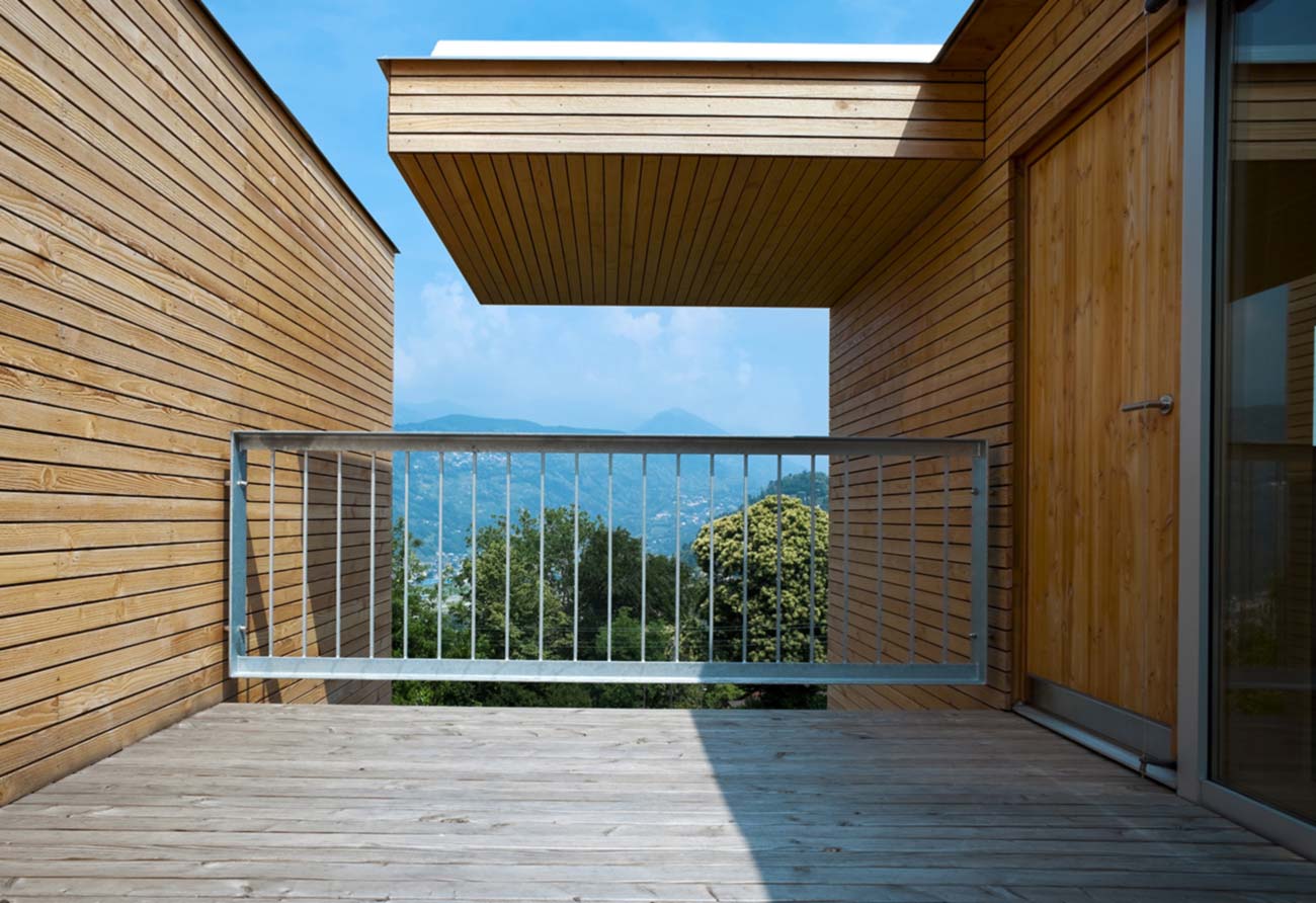 Wooden bridge connecting two apartments with an interior design setting in Ras Al Khaimah.