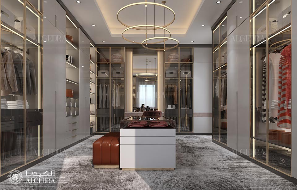 dressing room design in Abu Dhabi & Ras Al Khaimah featuring a luxurious mirrored cupboard and chandelier