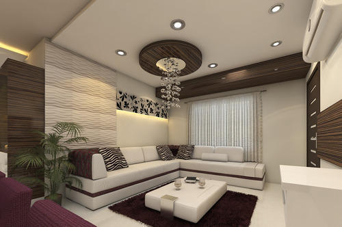 Elegant living room with plush sofas, a crystal chandelier, and a modern TV setup, showcasing a balance between modern and traditional interior design in a beautifully designed house.