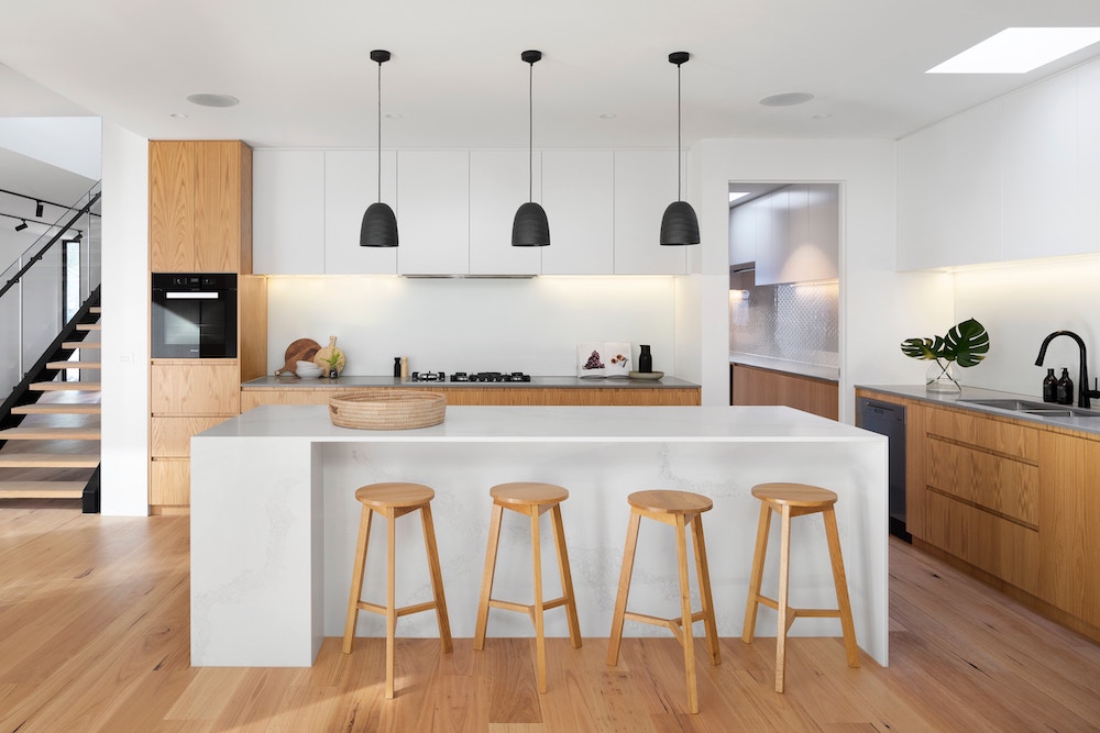 Elegant minimal kitchen design showcasing antique vibes in Abu Dhabi.