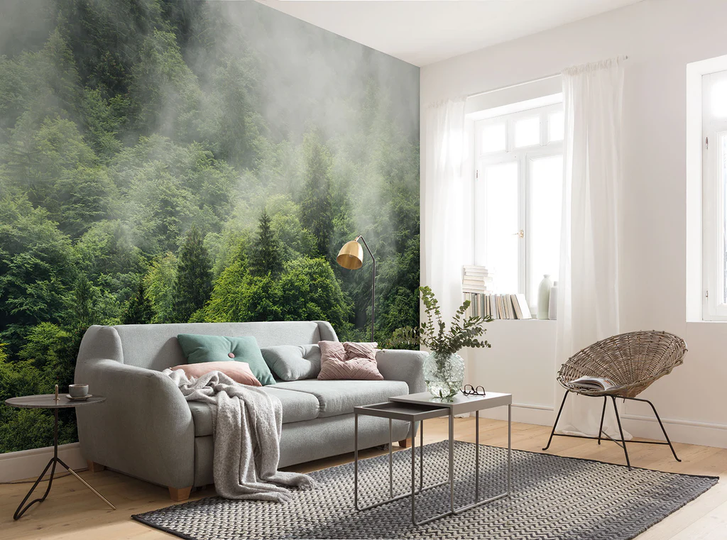 A serene corner with a white wall, elegant chair, and green elements, reflecting how interior design positive influence mental health and mood.